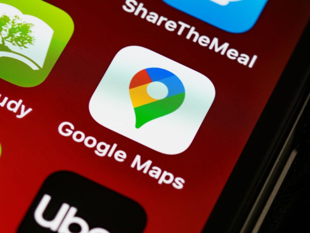 Google Maps app icon on a smartphone — where Swiss local searches turn into customers