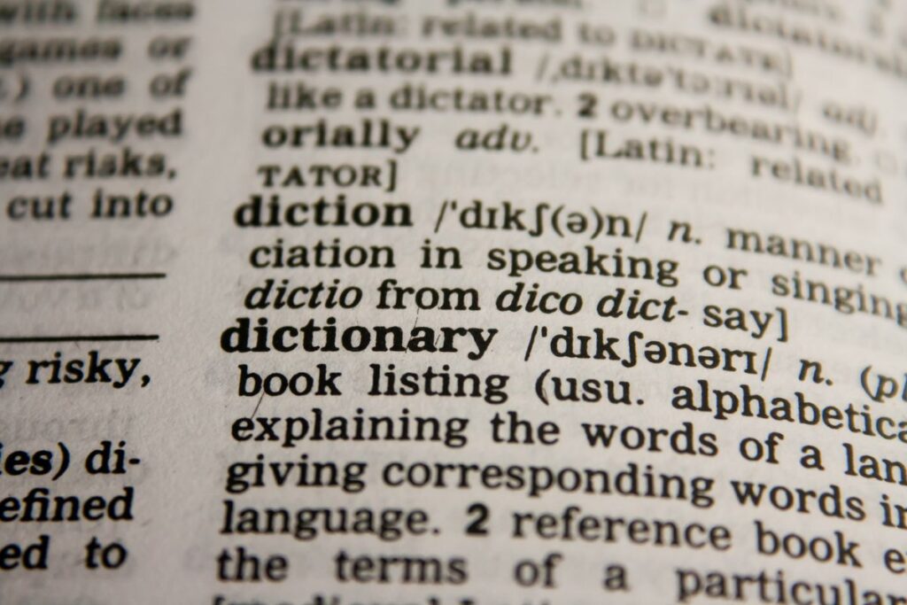 Close-up of a dictionary page — keyword research across languages for Swiss multilingual SEO